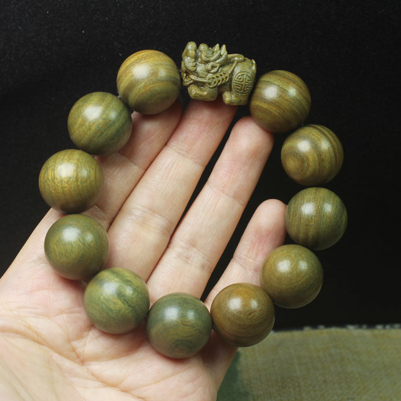 Green Sandalwood Beads Bracelet with Carved Pixiu Charm, suitable for men and women, traditional Chinese style, wholesale available.